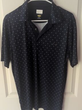Greg Norman Golf Collection Navy Polo with Light Blue Microprint